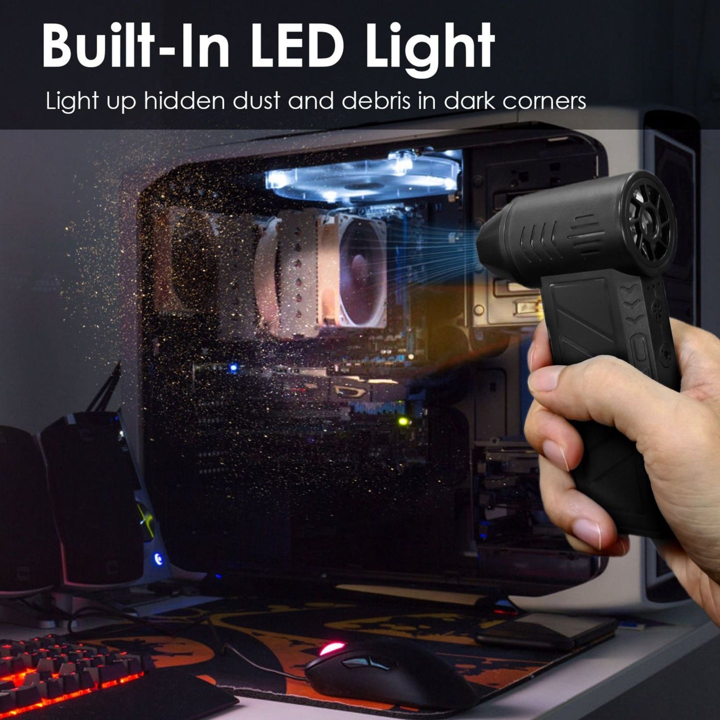 Person using a computer cleaning tool with a built-in LED light to inspect a dusty computer case.